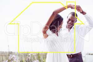 Composite image of romantic couple dancing and smiling