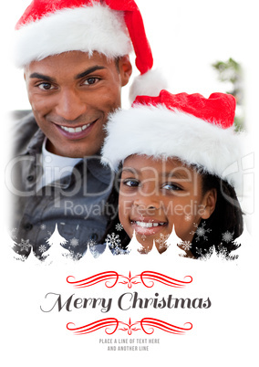 Composite image of portrait of an father and son holding a chris