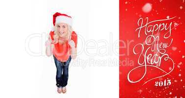 Composite image of fairhaired woman putting her thumbs up while