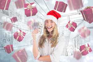 Composite image of festive blonde holding fan of dollars