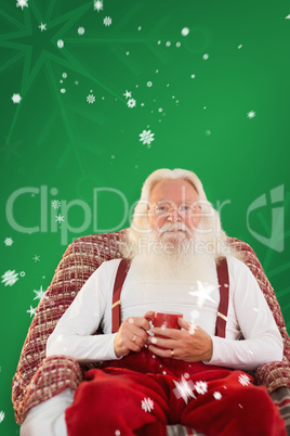 Composite image of father christmas sitting on the armchair hold