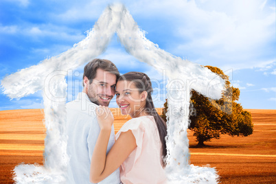 Composite image of attractive young couple smiling at camera