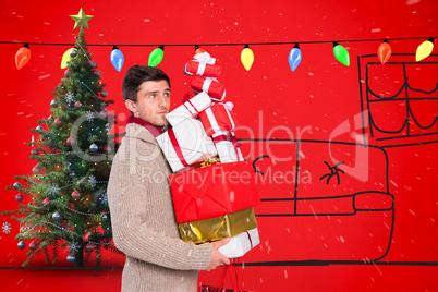 Composite image of young man with many christmas presents