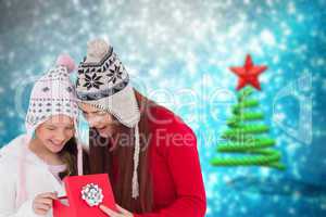 Composite image of mother and daughter with gift