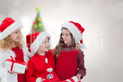 Composite image of cute children with gifts