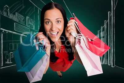 Composite image of woman standing with shopping bags