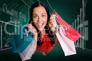 Composite image of woman standing with shopping bags