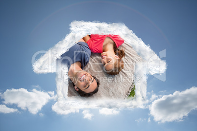 Composite image of two friends looking towards the sky while lyi