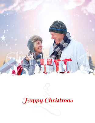 Composite image of festive mature couple holding christmas gifts