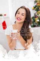 Composite image of smiling brunette holding a mug