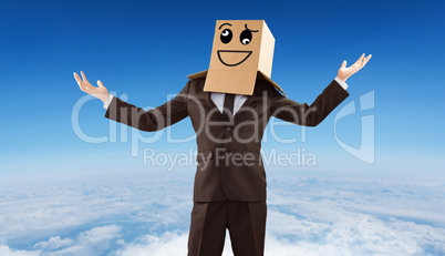 Composite image of anonymous businessman holding his hands out