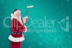 Composite image of father christmas paints a wall