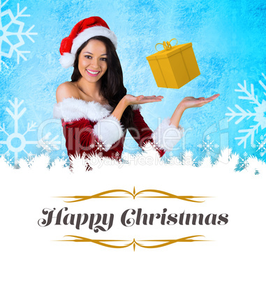 Composite image of pretty girl presenting in santa outfit