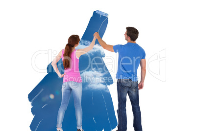 Composite image of couple painting together