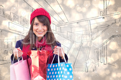 Composite image of smiling brunette opening gift bag