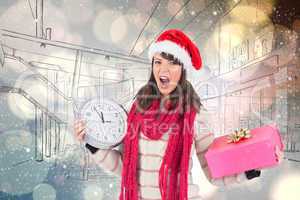 Composite image of yelling brunette holding a clock and gift