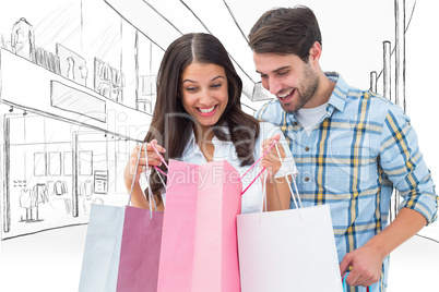 Composite image of happy couple with shopping bags