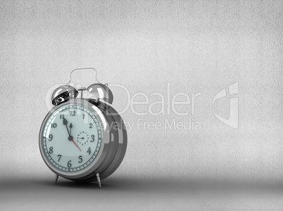 Composite image of alarm clock counting down to twelve