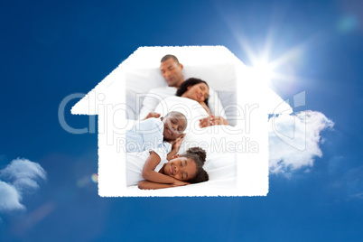 Composite image of jolly family sleeping