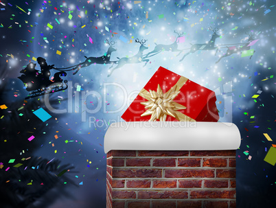 Composite image of santa flying his sleigh behind chimney