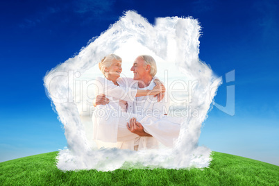Composite image of man carrying his wife on the beach