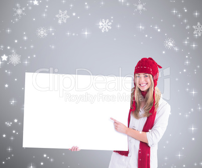 Composite image of pretty blonde showing white poster