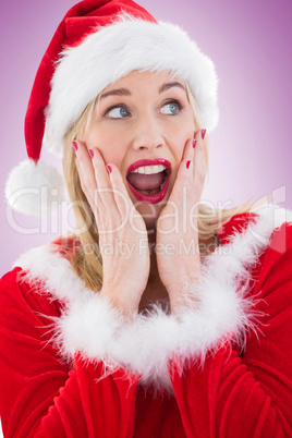 Festive blonde with hands on face