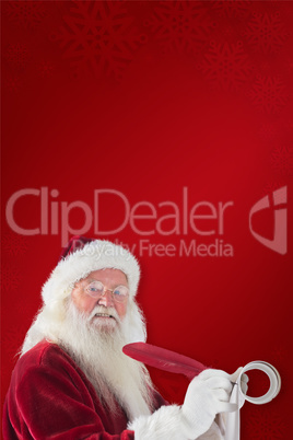 Composite image of father christmas writes a list