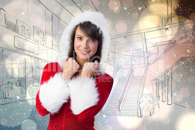 Composite image of cute brunette in santa claus smiling at camer