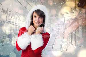 Composite image of cute brunette in santa claus smiling at camer