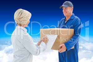 Composite image of happy delivery man with customer