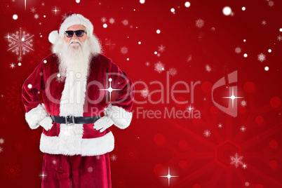 Composite image of santa claus wears black sunglasses