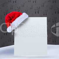 Composite image of santa hat on poster