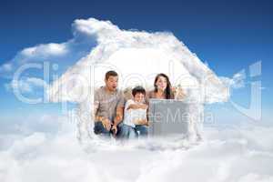 Composite image of happy family watching a movie on television t