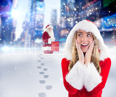 Composite image of pretty santa girl with hands on face