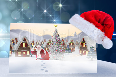 Composite image of santa delivery presents to village