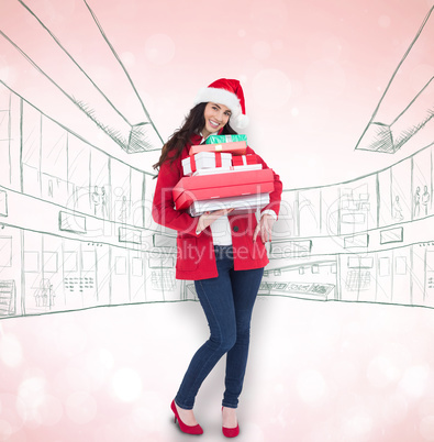 Composite image of festive brunette in santa hat and red coat ho