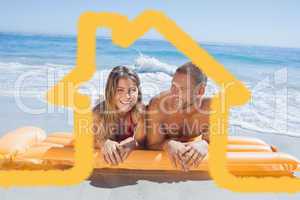 Composite image of cheerful cute couple in swimsuit lying on the