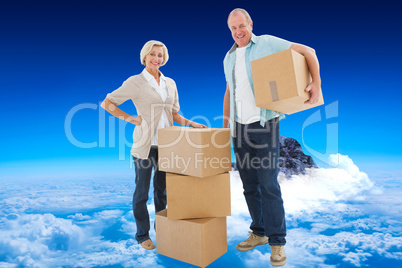 Composite image of older couple smiling at camera with moving bo
