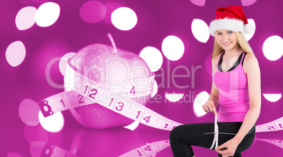 Composite image of fit festive young blonde measuring her thigh