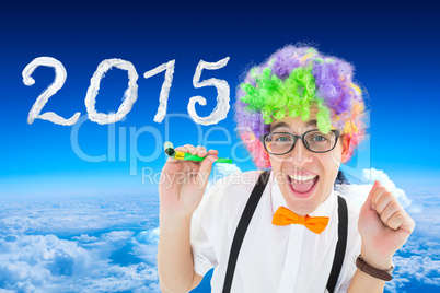 Composite image of geek ready to party