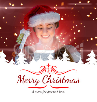 Composite image of sexy girl in santa costume opening a gift