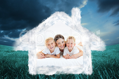 Composite image of laughing children playing with their mother l