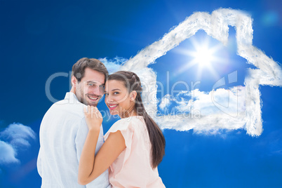 Composite image of attractive young couple smiling at camera