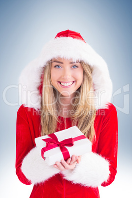 Sexy santa girl holding gift