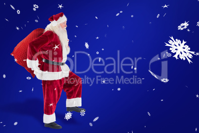 Composite image of santa jumps with his bag