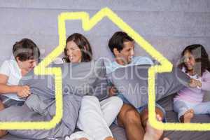Composite image of family having fun together on bed