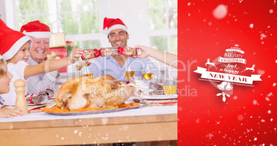 Composite image of siblings pulling a christmas cracker