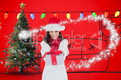 Composite image of festive brunette in santa hat giving gift