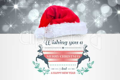Composite image of colourful banner wishing a happy christmas